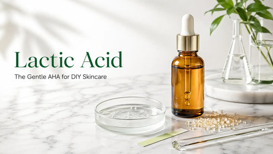 Cosmetic-grade lactic acid in a clear glass dropper bottle on a white marble lab surface — AHA active for DIY skincare.