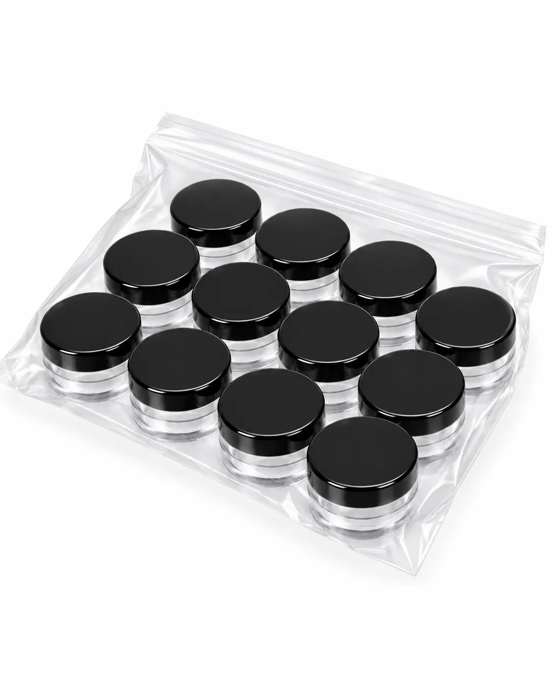 12_empty_10gm_clear_cosmetic_jars_without_lids_arranged_on_white_background