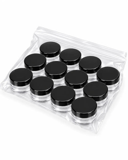 12_empty_10gm_clear_cosmetic_jars_without_lids_arranged_on_white_background