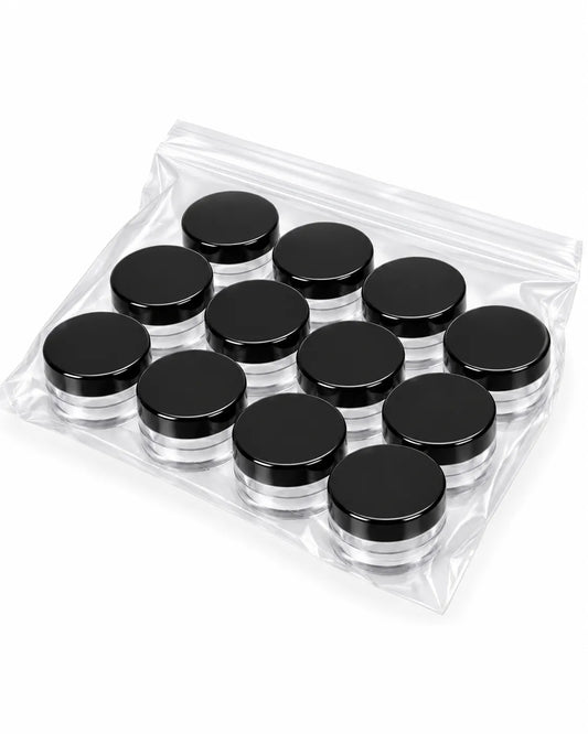 12_empty_10gm_clear_cosmetic_jars_without_lids_arranged_on_white_background