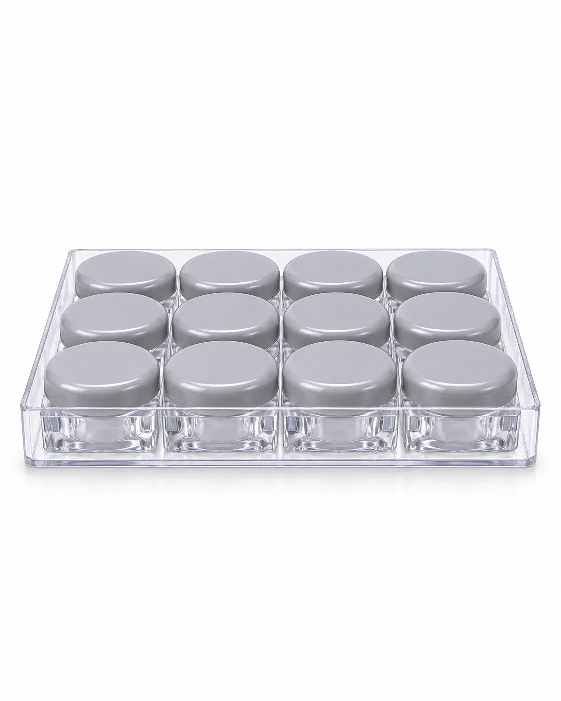 12 empty 10gm clear square lip balm jars with purple screw lids arranged in a transparent storage tray