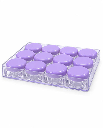 12 empty 10gm clear square lip balm jars with purple screw lids arranged in a transparent storage tray