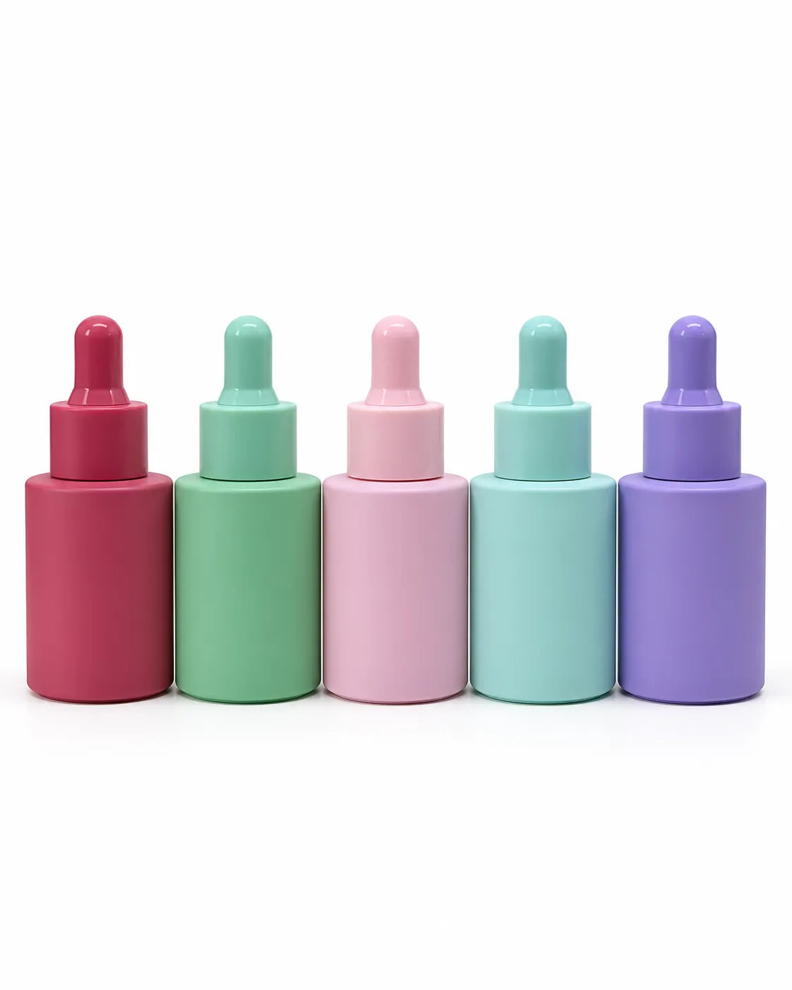 30ml pastel serum dropper bottles in purple green mint and pink on white background