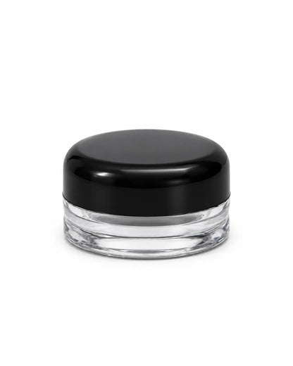 12 empty 5gm round cosmetic jars with black screw lids arranged on white background