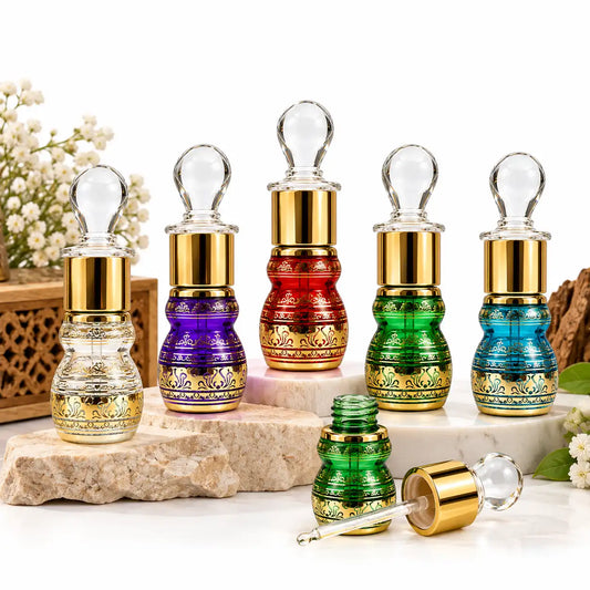 Premium empty 6ml Arabic attar bottle with gold decorative design and glass stick applicator