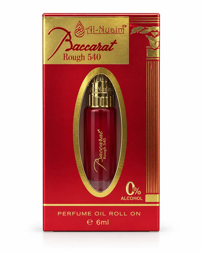 Al-Nuaim Baccarat Rough 540 6ml roll-on attar in a red-to-clear glass bottle with an ornate gold cap on a white background.