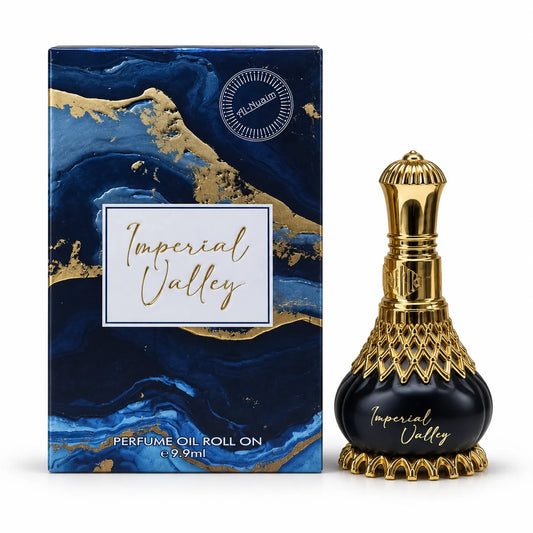 Al-Nuaim Imperial Valley 9.9ml roll-on perfume oil in a black bottle with a gold-tone cap beside its blue marbled box.