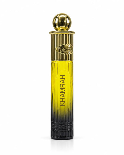 Al-Nuaim Khamrah 6ml roll-on attar in a yellow-to-black glass bottle with an ornate gold-coloured cap on a white background.