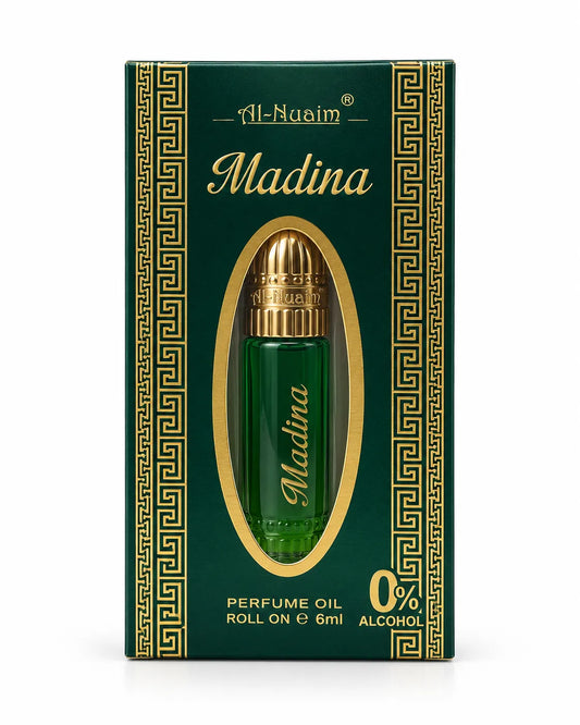 Al-Nuaim Madina 6ml roll-on perfume oil in a green and gold box with an oval display window and 0% alcohol label.