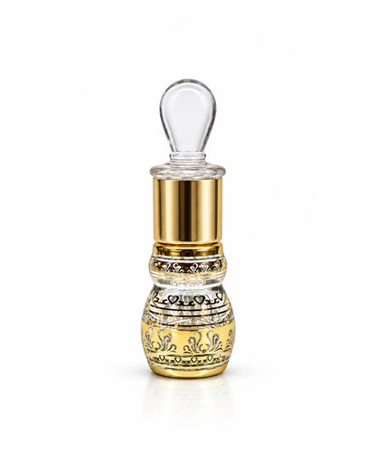 6ml Arabic glass attar bottle with gold detailing and clear glass stick on white background