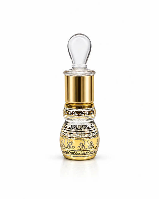 6ml Arabic glass attar bottle with gold detailing and clear glass stick on white background
