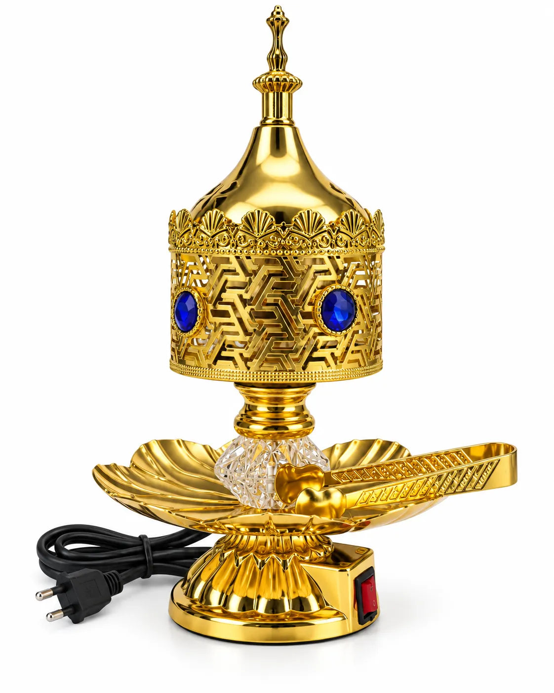 Golden electric bakhoor burner with blue decorative stones, a clear faceted stem, petal-shaped tray, separate lid, and tongs.
