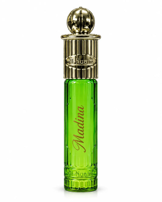 Al-Nuaim Madina 6ml roll-on attar in a green glass bottle with an ornate gold-coloured cap on a white background.