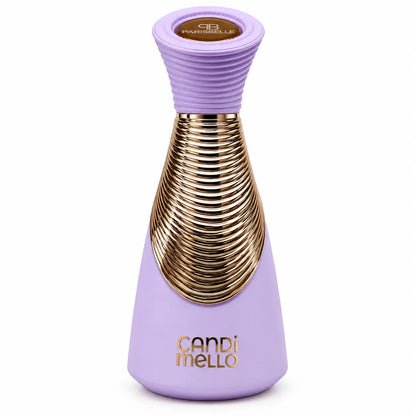 Candi Mello fragrance bottle held in hand while spraying