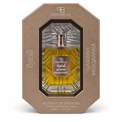 Parisbelle Qasrah Misqahwa perfume resting in a light-coloured insert inside its open presentation box