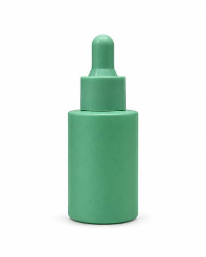Empty 30ml serum dropper bottles in soft pastel shades for DIY cosmetics