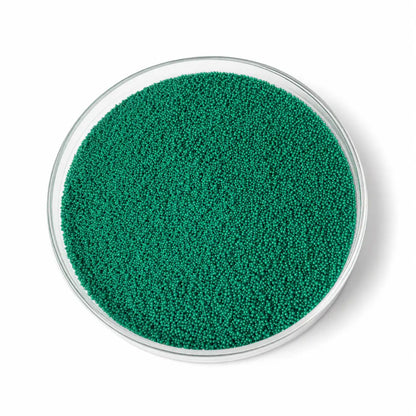 Green Jojoba Beads in Glass Dish for Cosmetic Exfoliating Scrubs