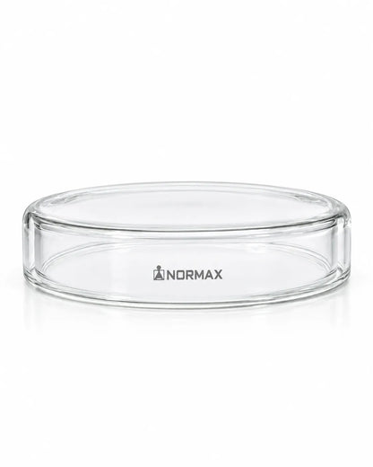Normax clear glass Petri dish with the lid in place and the brand logo visible on a white background.
