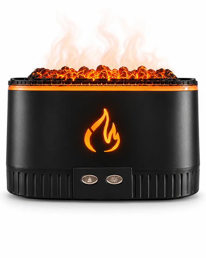 Black coal-effect flame aroma diffuser with two front buttons and AROMA retail packaging on a white background.