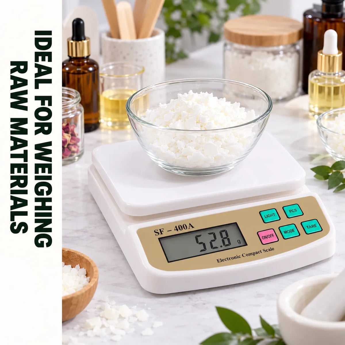 SF-400A digital electronic weighing scale 1g to 10kg with white platform, gold control panel and LCD display for cosmetic ingredient measuring.
