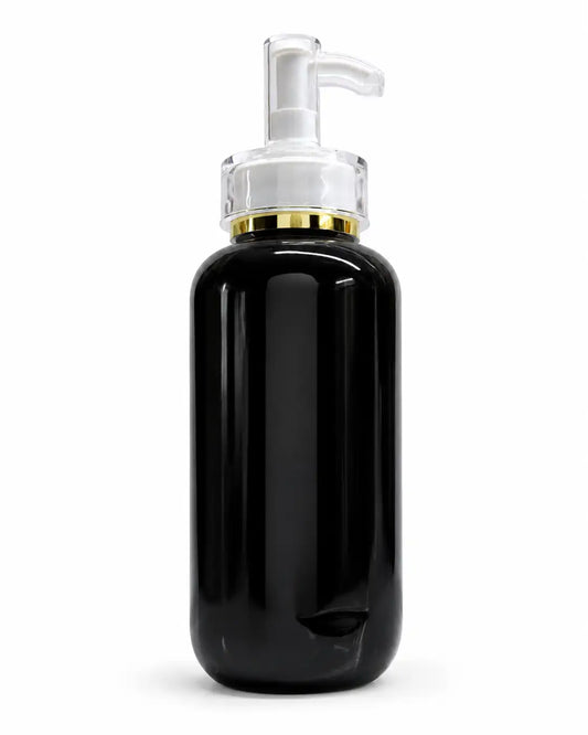 Black_Cosmetic_Pump_Bottle_with_Transparent_Pump_and_Gold_Ring_for_Premium_Packaging